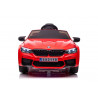 Elektromos utazás BMW M5 pirosra festve