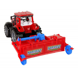 Piros traktor eke súrlódó meghajtással
