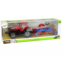 Piros traktor eke súrlódó meghajtással