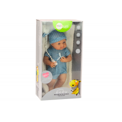 Baba baba kék ruhában, sapkában, cumiban és takaróban